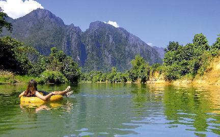 Tubing por Nam Song, Laos